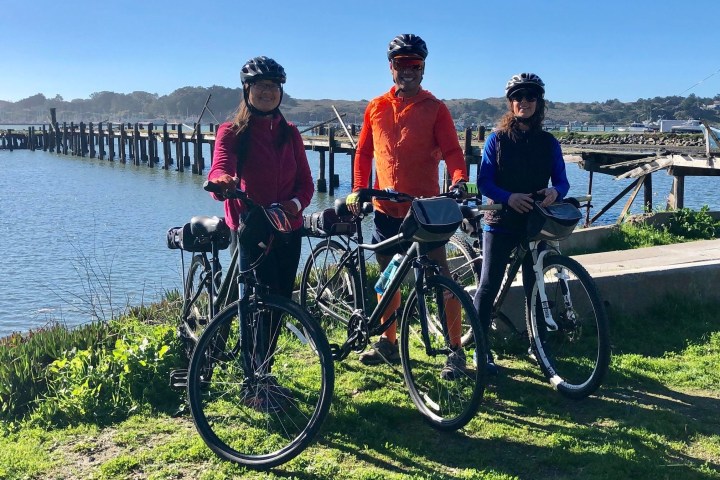 Three people by Bodega Bay