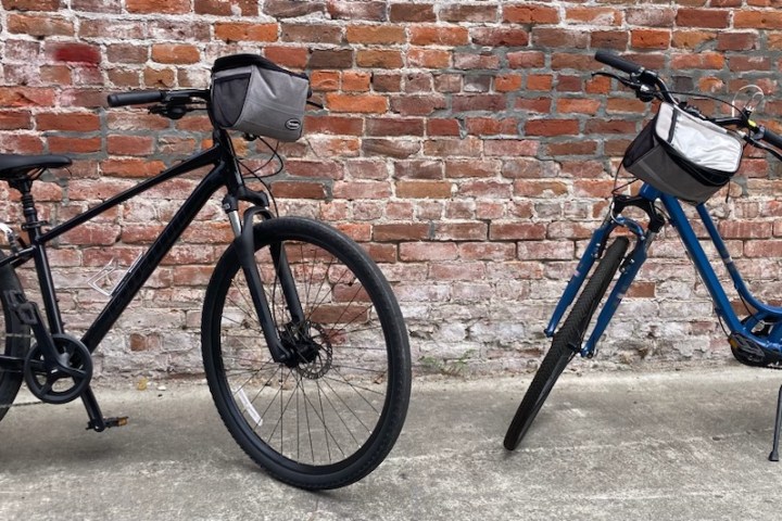 a bicycle parked in front of a brick building